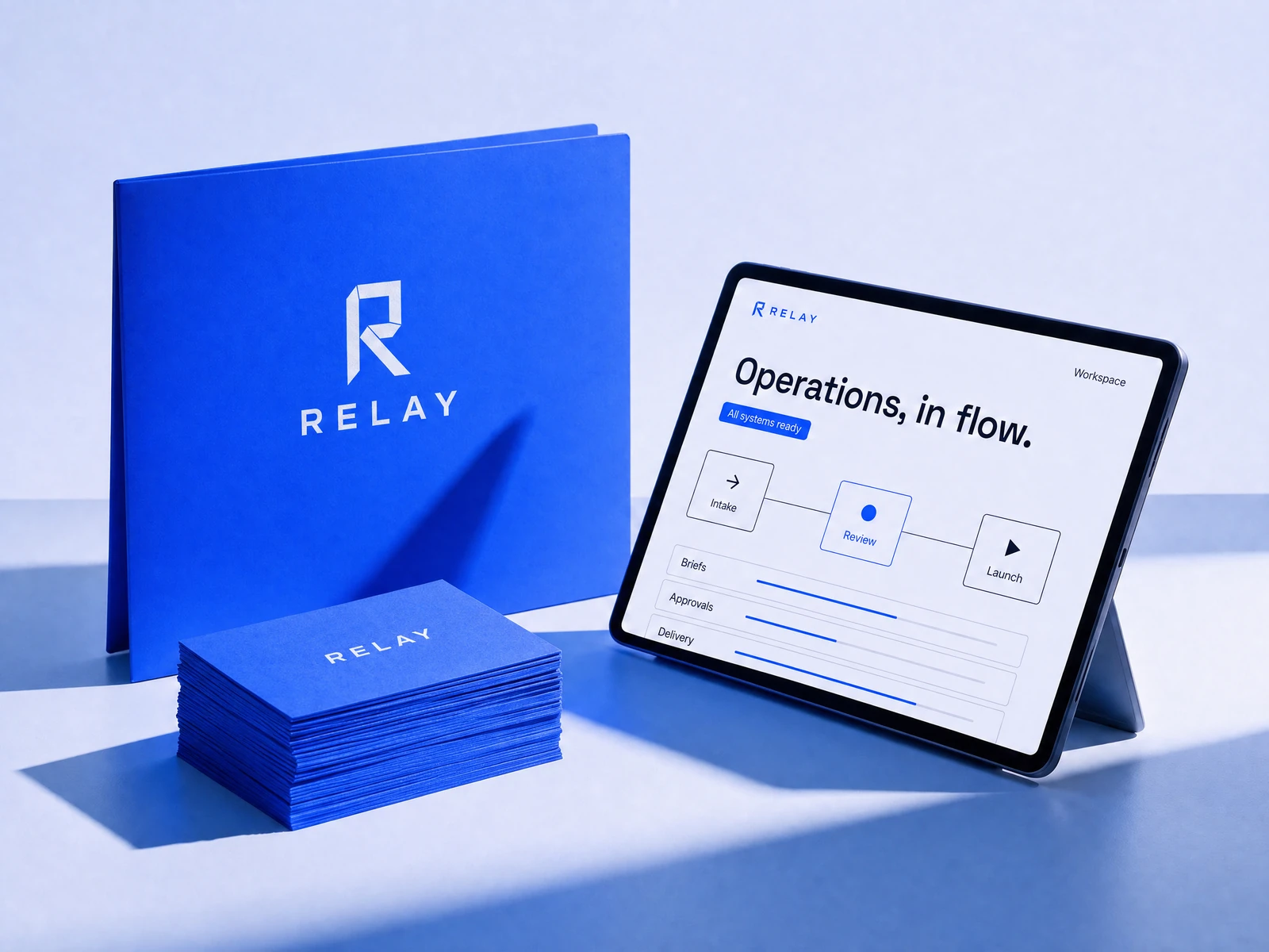 RELAY concept identity applied to a cobalt and silver technology brand presentation